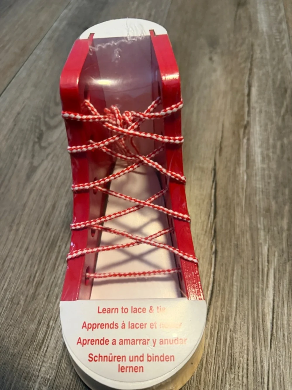 Melissa & Doug Wooden Lacing Shoe Toy in Red and White